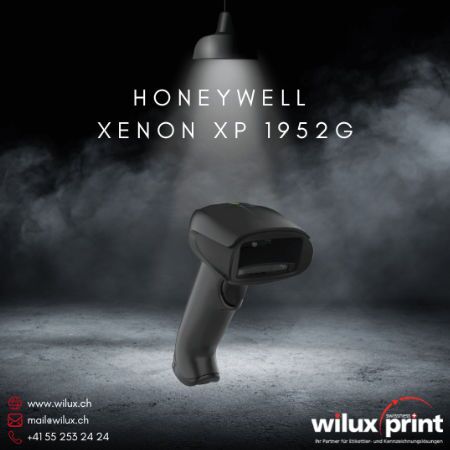 Der kabellose Honeywell Xenon XP 1952G Barcode Scanner steht unter einer Lampe auf einem nebligen Hintergrund und bietet robuste Leistung für Einzelhandel, Gesundheitswesen und Fertigung.