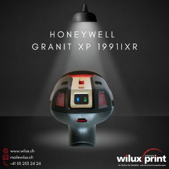 Nahaufnahme des Honeywell Granit XP 1991iXR Barcode-Scanners mit hervorgehobenem Bluetooth-Symbol auf der Rückseite. Der Scanner steht unter einem Scheinwerfer, der seine robuste Bauweise betont.