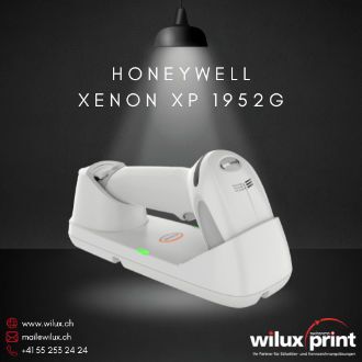 Kabelloser Honeywell Xenon XP 1952g Barcode-Scanner in Weiss, auf einer Basisstation, unter einer beleuchteten Lampe. Ideal für den Einzelhandel und Logistikanwendungen.