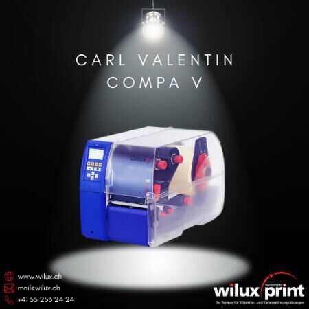 Carl Valentin Compa V Thermodirekt- und Thermotransferdrucker, robustes Design mit transparenter Abdeckung, geeignet für industrielle Etikettierlösungen, unterstützt grosse Etikettenrollen und bietet hohe Druckgeschwindigkeiten.