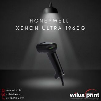 Das Bild zeigt den Honeywell Xenon Ultra 1960g Barcode-Scanner unter einer beleuchteten Lampe. Der Scanner ist robust, ergonomisch und für schnelles, präzises Scannen in anspruchsvollen Umgebungen konzipiert.