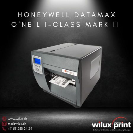 Honeywell Datamax O'Neil I-Class Mark II Industriedrucker in grauem Gehäuse mit LCD-Display und offenem Druckmechanismus, zeigt den laufenden Etikettendruck. Ideal für industrielle Anwendungen in Logistik, Fertigung und Lagerhaltung.