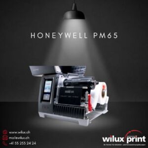 Honeywell PM65 Etikettendrucker mit offener Haube, zeigt Rollenhalterung und integrierte RFID-Druckfunktion für hohe Effizienz in industriellen Anwendungen.