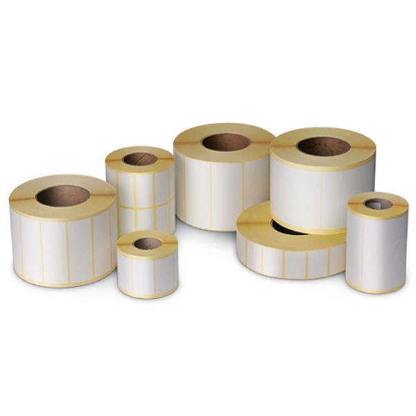 White thermal transfer labels on roll in various shapes, sizes and materials